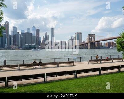 New York, USA - May 31, 2019: Manhattan seen from the Brooklyn Bridge Park. Stock Photo