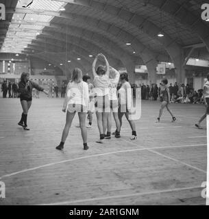 Autumn tournament for schools (presumably) in the RAI in Amsterdam  Girls from the HAVO school while playing volleyball. One of the girls has written Dave Berry (English singer) on her shirt Date: 1 November 1965 Location: Amsterdam, Noord-Holland Keywords: girls, sports, tournaments, volleyball Institution name: RAI Stock Photo