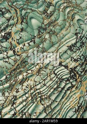 Hand marbled pastedown or endpaper from 18th century book binding featuring the Spanish moiré technique (Turkish pattern with a wave effect pattern). Stock Photo