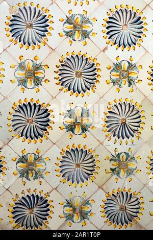 19th century Islamic floral designs on ceramic wall tiles from a mansion in the Tunis Medina, on display in the Bardo National Museum Tunis, Tunisia. Stock Photo