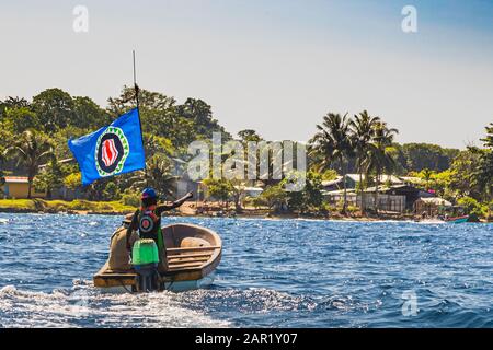 Small ferry, with the Bougainville independence flag hoisted, Papua New Guinea Stock Photo