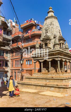 Mother and child at the Lohan Dehar temple in Kirtipur, Nepal Stock Photo