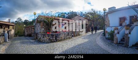 FATIMA, PORTUGAL - Mar 18, 2018: People walking near coffee at Pia do Urso village, Fatima, Portugal Stock Photo
