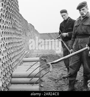 drainage, tubes, loading Date: November 1958 Keywords: tubes, drainage, loading Stock Photo