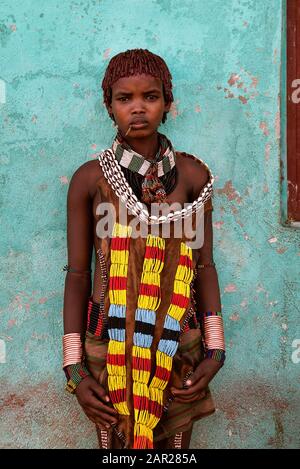 Konso, Ethiopia - August 7, 2018: Unidentified young Hamer tribal woman posing on the market Stock Photo