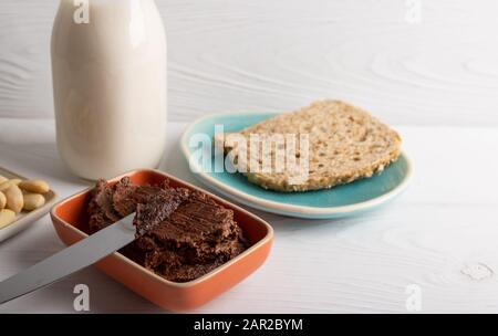 Vegan chocolate spread made of organic almond butter and organic cacao and honey Stock Photo