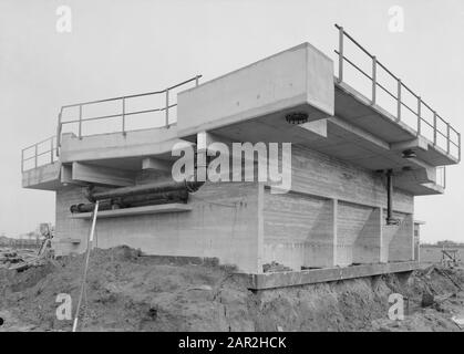 cleaning waste water, handling urban waste, sewage treatment plants, bordesses, imhoff-tank Date: 1965 Location: Den Oever Keywords: bordessen, cleaning wastewater, sewage treatment plants, municipal waste processing person name: imhoff-tank Stock Photo