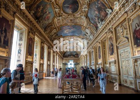 Visitors in Galerie d'Apollon in Denon Wing of Louvre Museum (Musée du Louvre) in Paris, France Stock Photo