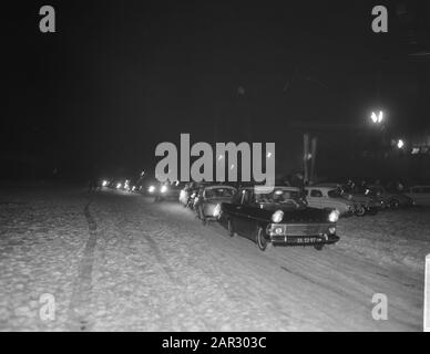 Big ice night party on the Gouwzee between Maasdam and Volendam. Printed cars Date: 23 February 1963 Keywords: IJspret, cars Stock Photo