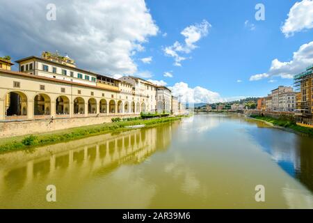 The Uffizi Gallery and the Arno River taken from the Ponte Vecchio bridge on the Arno River in Florence Italy Stock Photo