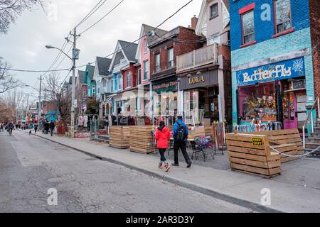 Street scene, people walking on sidewalk on Kensington Ave, Kensington Market, street life, downtown Toronto, Ontario, Canada Stock Photo