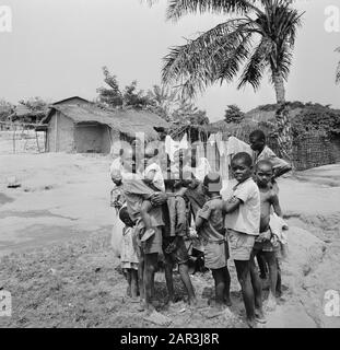 Zaire (formerly Belgian Congo)  Group of children in an Angolan refugee camp north of Kinshasa Date: October 24, 1973 Location: Congo, Zaire Keywords: children, refugees, refugee camps Stock Photo