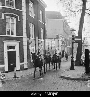 Carless Sunday in connection with the oil boycott  With horses by the Jordaan Date: 4 november 1973 Location: Amsterdam, Noord-Holland Keywords: car-free Sundays, oil boycott, oil crisis, horses, riders Stock Photo