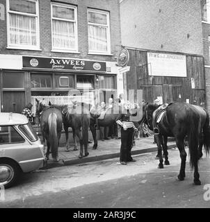 Carless Sunday in connection with the oil boycott  Horses for a café Date: 4 November 1973 Keywords: car-free Sundays, cafes, oil boycott, oil crisis, horses Stock Photo