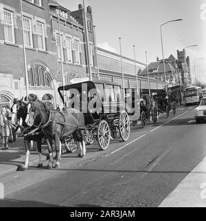 Second carless Sunday in connection with the oil boycott  Carriage for the station of Haarlem Date: 11 november 1973 Location: Haarlem, Noord-Holland Keywords: car-free, carriages, oil boycott, horses, stations Stock Photo