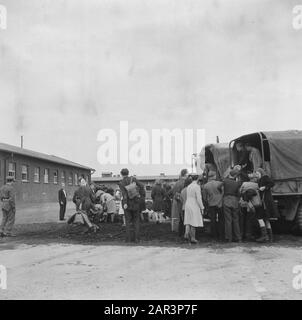 Repatriation Camp Rheine (Germany)  [Repatriants get out of truck] Date: 1945 Location: Germany, Rheine Keywords: repatriation, World War II Stock Photo