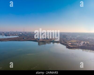 Aerial landscape photo of Morii Lake , Bucharest, Romania with many buildings in the distance Stock Photo