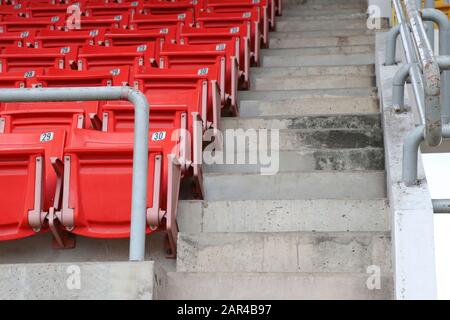 A chair for watching sports on the amphitheater. Chairs lined up in the stands. Stock Photo