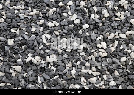 Black and white gravel background. Black and white stone background. Stock Photo
