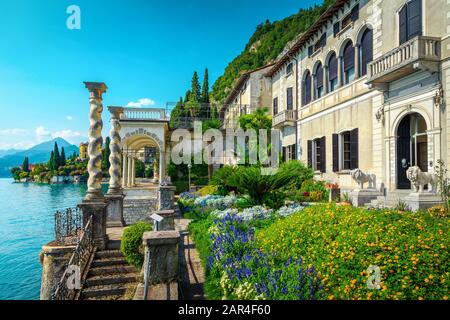 Touristic villa Monastero and amazing ornamental garden with colorful flowers in Varenna resort, lake Como, Lombardy region, Italy, Europe Stock Photo