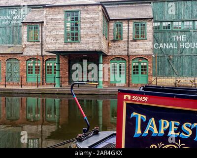 BIRMINGHAM, UK - MAY 28, 2019:  View ofThe Canal House Bar Restaurant  over narrowboat moored on the canal at Brindley Place. Stock Photo