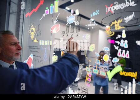 Business people work about a new startup project. Concept of teamwork, innovations and statistics. Stock Photo