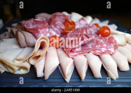 Sliced Processed Salami & Cold Meats on Display in the Buffet at the Azul Beach Resort Hotel, Puerto Morelos, Riviera Maya, Cancun, Mexico. Stock Photo