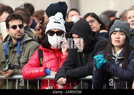 Spectators watch the parade during Chinese New Year celebrations in central London, which mark the start of the Year of the Rat. Stock Photo