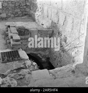 Israel 1948-1949  Jerusalem. Remains of the bath Bethesda in the old town north of the Temple Mount. Opening to the original water supply Date: 1948 Location: Israel, Jerusalem Keywords: archaeology, bathhouses, walls, water pipe Personal name: bethesda Stock Photo