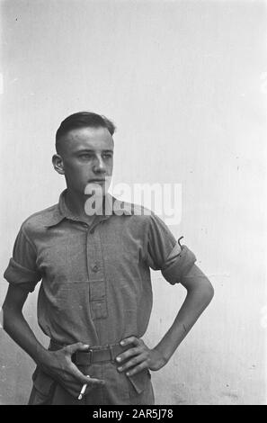 Passport Photos VI [Young man in polo shirt with rolled up sleeves and  bracelet? In his right hand a cigarette] Date: 1947/07/01 Location:  Indonesia, Dutch East Indies Stock Photo
