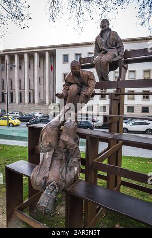 Thirteen Laughing at Each Other - sculptures created by Joan Munoz in Cordoaria Garden in Vitoria civil parish of Porto city in Portugal Stock Photo