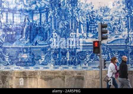 Side view on Azulejo tiles facade of Capela das Almas (also called Capela das Santa Catarina) - Chapel of Souls in Porto in Portugal Stock Photo