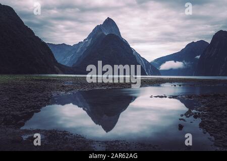 Stunning sunset at Milford Sound, New Zealand. Stock Photo