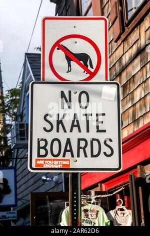 ROCKPORT, MASSACHUSETTS, USA - AUGUST 08, 2014:  A view of informative street sign in from Bear skin Neck Rockport Harbour Stock Photo