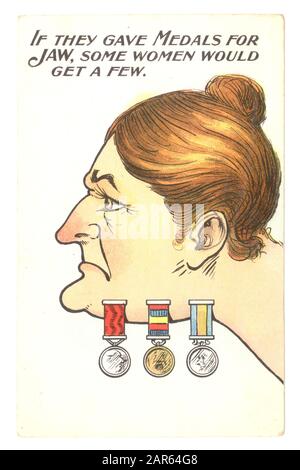 Early 1900's comic anti-suffragette postcard depicting a bossy woman with medals on her jaw, sticking her neck out by demanding equal voting rights for women U.K. The inference is that only unattractive women would be unfeminine enough to speak up for the women's suffrage campaign. It is blatantly against strong opinionated women. Women must keep their place. Stock Photo