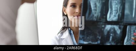 Young doctor with skiagram Stock Photo
