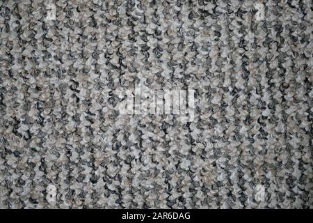 Carpet for the floor in the office. Gray synthetic carpet background. Felt carpet top view texture. Stock Photo