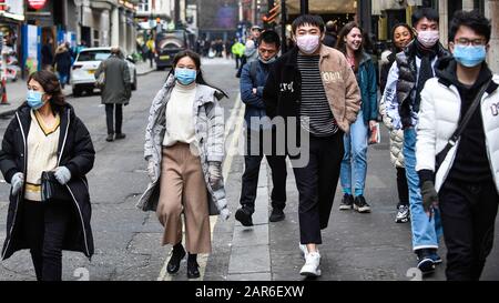 Download London January 26 2020 Chinese Women Wearing Face Mask Using Tablet At London Busy Street Stock Photo Alamy PSD Mockup Templates