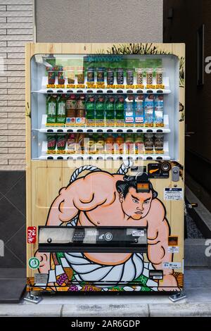 A vending machine in Tokyo decorated with a Sumo wrestler. Tokyo, Japan, August 2019 Stock Photo