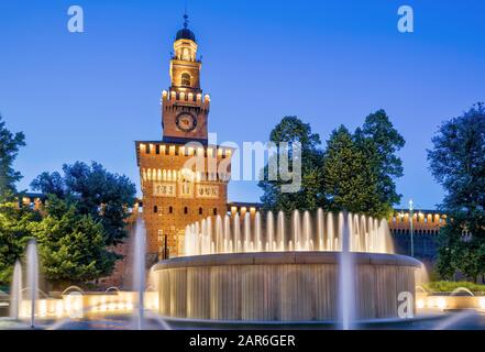 Sforza Castel (Castello Sforzesco) at night in Milan, Italy. This castle was built in the 15th century by Francesco Sforza, Duke of Milan. Stock Photo