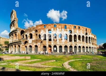 Colosseum or Coliseum in Rome, Italy. It is the main travel attraction of Rome. Colosseum in the sunlight. Rome landmark. Historical architecture and Stock Photo