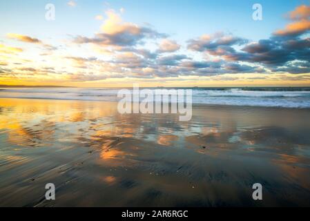 Beautiful sunrise at Coronado Central Beach. Coronado, California, USA. Stock Photo