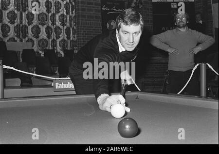 Dutch billiard championships honorary class tribands; nr. 4, 5 De Jong in action Date: January 5, 1978 Keywords: Billiards Stock Photo