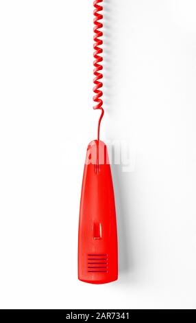 Retro red phone reciever on white background. with clipping path Stock Photo