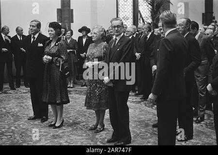 Reception in the Knight Hall in honor of the 450 year anniversary of the Council of State  On the front row from left to right Prince Claus, Queen Beatrix, Princess Juliana and W. Scholten during the reception Date: 1 October 1981 Location: The Hague, Zuid-Holland Keywords: advisory councils, guests, anniversaries, receptions Personal name: Beatrix, queen, Claus, prince, Juliana (queen Netherlands), Juliana, princess, Scholten, W. Institution name: Council of State, Knight Hall Stock Photo