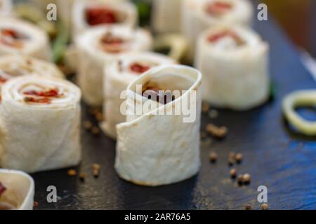 Fresh pita rolls with salmon. Selective focus. Stock Photo