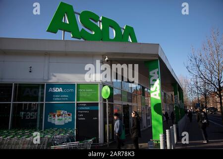 Asda supermarket chain on Old Kent Road on 9th January 2020 in London, England, United Kingdom. Asda Stores Ltd. is a British supermarket retailer, headquartered in West Yorkshire. The company was founded in 1949 and was listed on the London Stock Exchange until 1999 when it was acquired by the American retail giant Walmart for £6.7 billion. Asda was the second-largest supermarket chain in Britain between 2003 and 2014 by market share, at which point it fell into third place. Since April 2019, it has regained its second-place position. Stock Photo