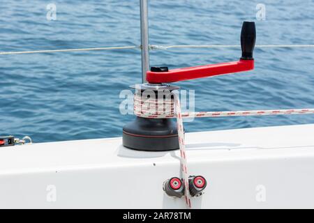 Hand winch on a sailboat while sailing. Stock Photo