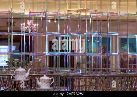 Detail of suspended light sculpture's translucent cubes within atrium. Iri-Descent , Fortnum & Mason, London, United Kingdom. Architect: Liz West, 201 Stock Photo