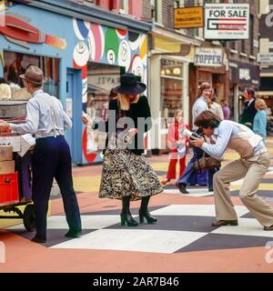 London 1970s, photographer shooting pictures with female fashion model, Carnaby street, Soho, England, UK, GB, Great Britain, Stock Photo